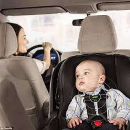 infant in car seat with alarm