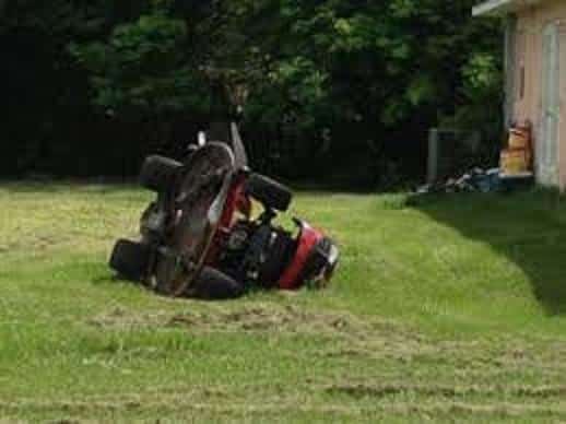 lawn mower turned over