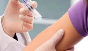 doctor injecting a vaccine