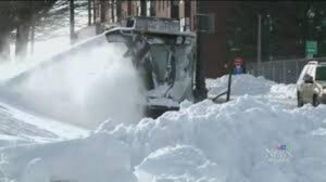 snow plow removing snow